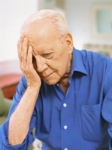 close-up of a senior man looking sad